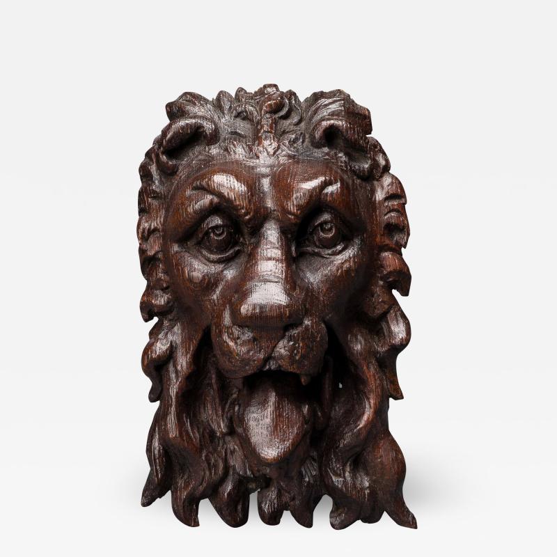 A Superb Elizabeth I Carved Oak Lion Mask Mount