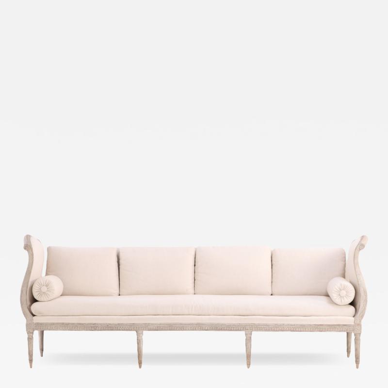 A Swedish Gustavian style painted settee daybed w cushions C 1800 
