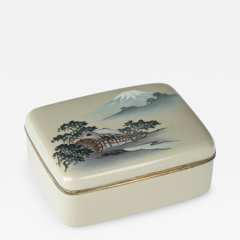A Taisho period cloisonn box and cover with a watermill and Mount Fuji
