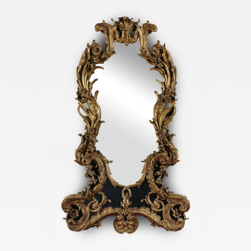 A VERY FINE AND UNUSAL GILTWOOD MIRROR