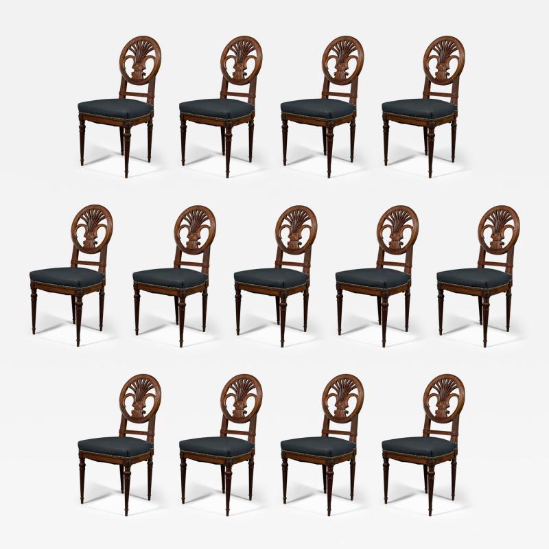 A VERY RARE SET OF FOURTEEN MAHOGANY DINING CHAIRS
