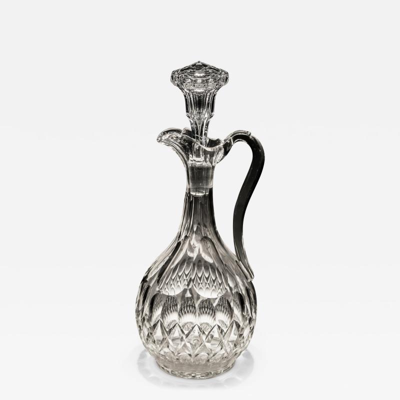 A VICTORIAN PILLAR SCALE CUT CLARET JUG