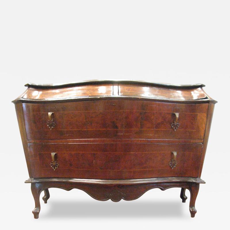 A Venetian Rococo Walnut and Burl Walnut Commode