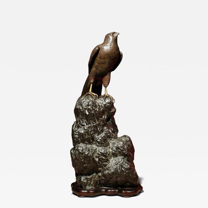 A Very Decorative Fine Japanese Bronze Sculpture a Hawk Sitting on a Craggy Rock