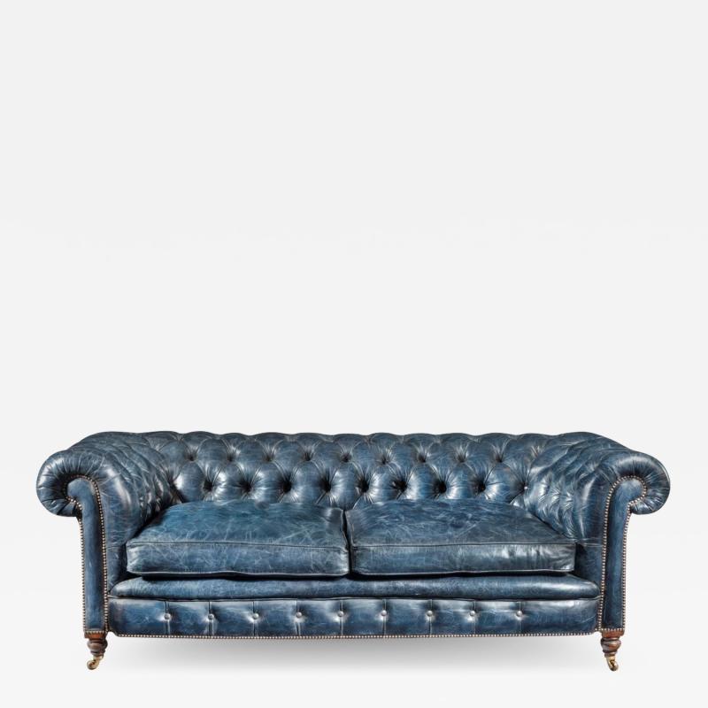 A Victorian 2 seater leather Chesterfield sofa