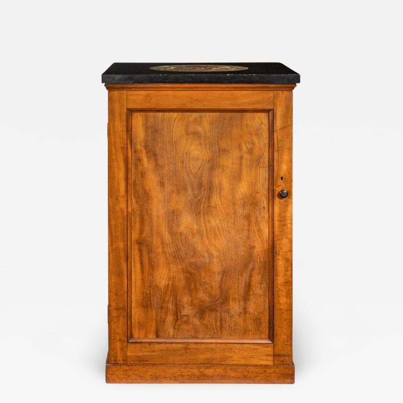 A Victorian mahogany collector s cabinet with a fossil marble top