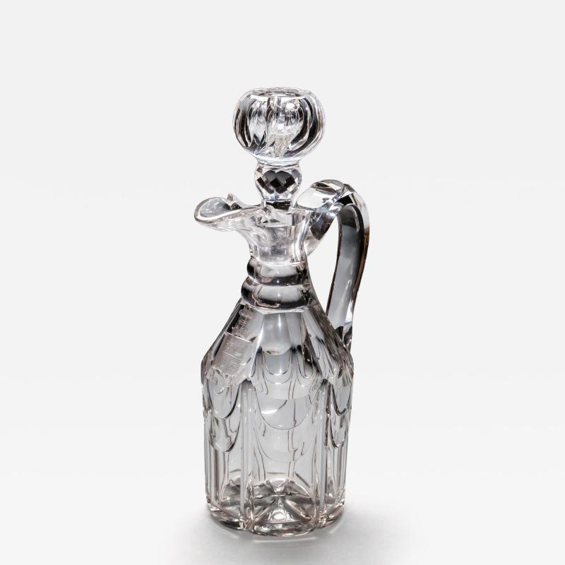 A WILLIAM IV ARMOURIAL CLARET JUG