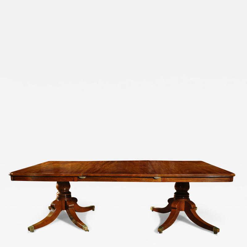 A WILLIAM IV MAHOGANY TWO PEDESTAL DINING TABLE