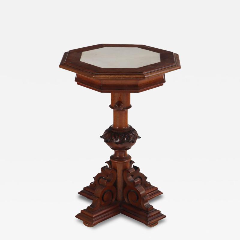 A carved walnut adjustable pedestal table 19th C 