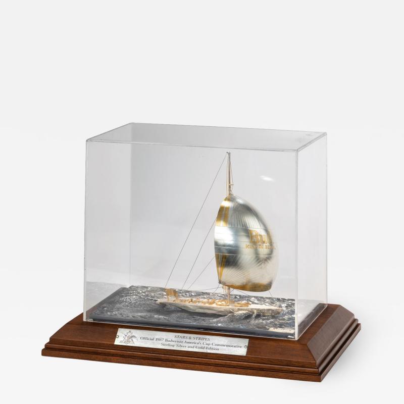 A cased silver and gilt model of 12 Meter America s Cup yacht Stars Stripes 87