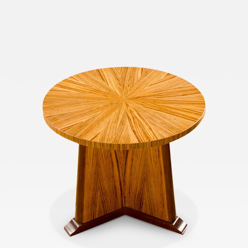 A contemporary round zebra wood table in the Art Deco style 