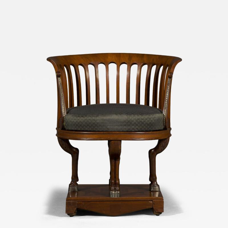 A fine and unusual neoclassical mahogany and silvered bronze