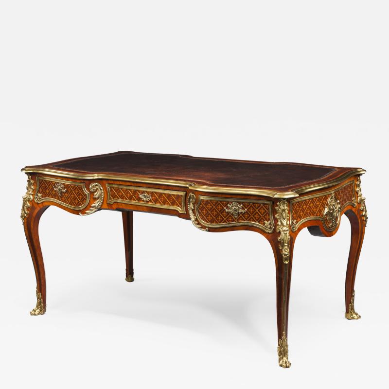 A fine kingwood and marquetry bureau plat in the French taste