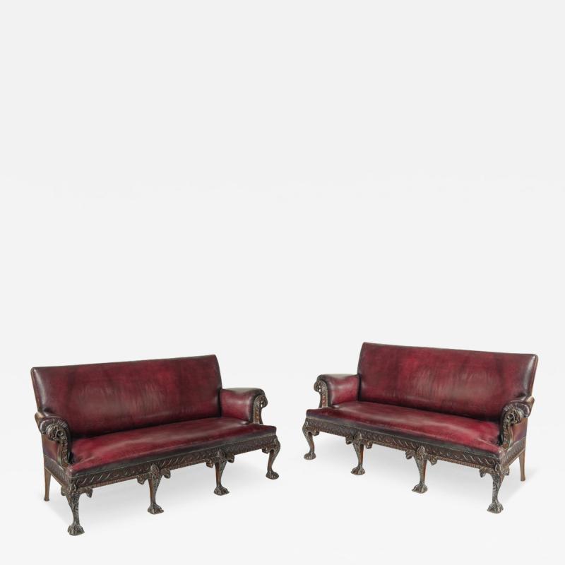 A fine pair of large late Victorian mahogany eagle sofas