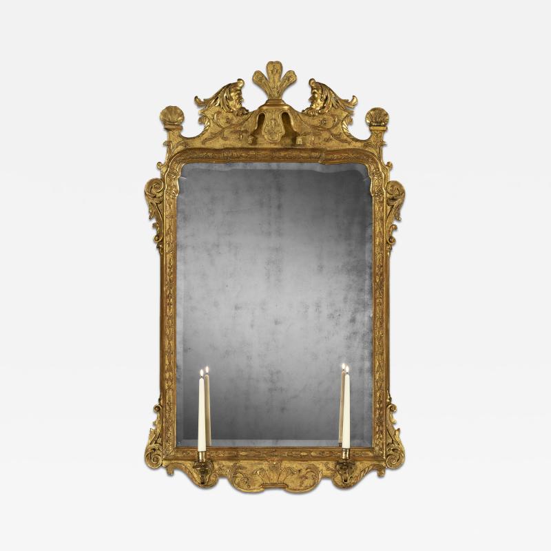 A george I Period carved and gilt gesso mirror