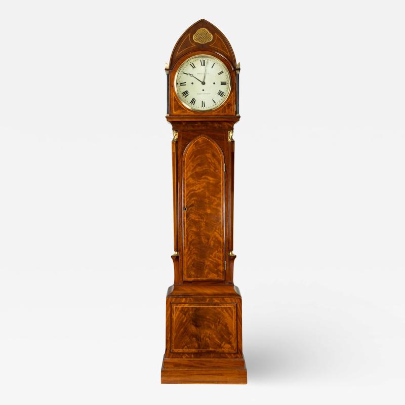 A good quality Regency Egyptian style mahogany longcase clock by John Grant