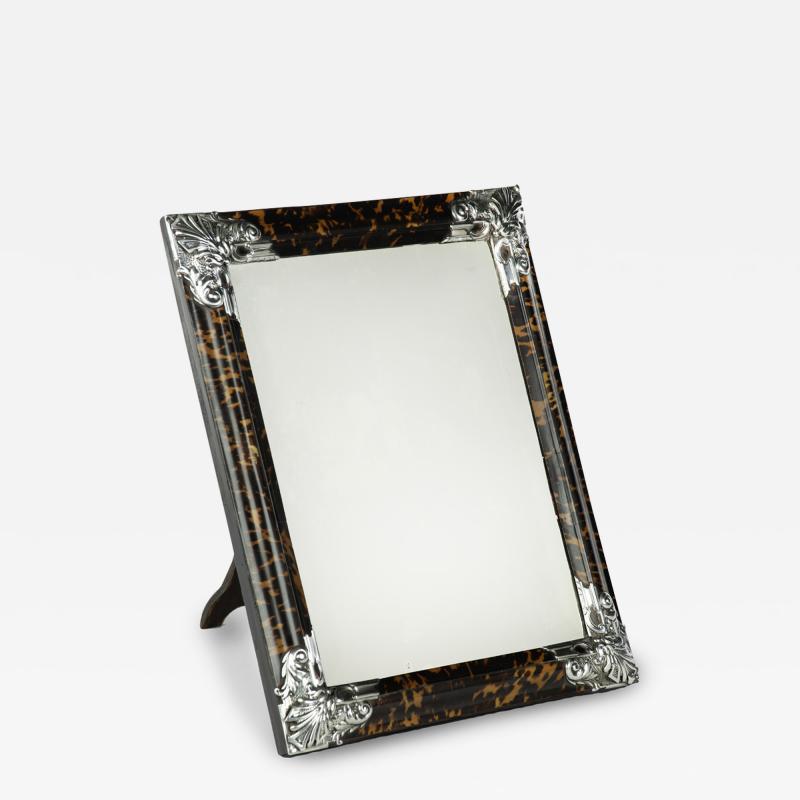 A large Art Deco silver mounted tortoiseshell easel mirror