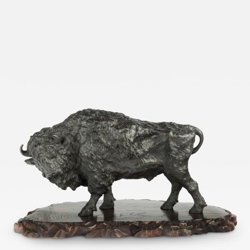 A large Meiji period bronze bison by Sano Takachika for the Kakuha Company