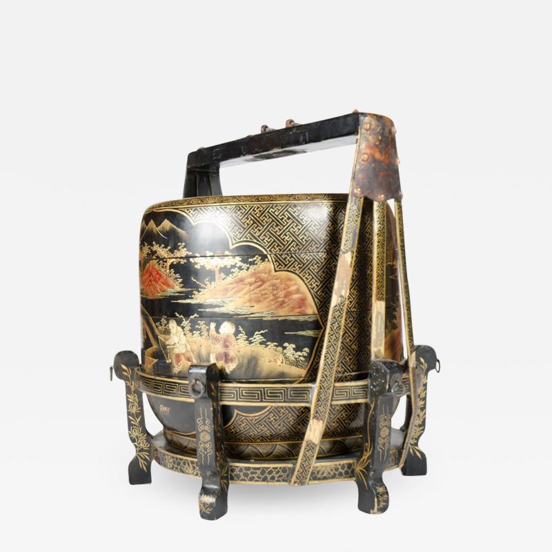A large black lacquer four tiered painted Chinese Wedding Basket circa 1940
