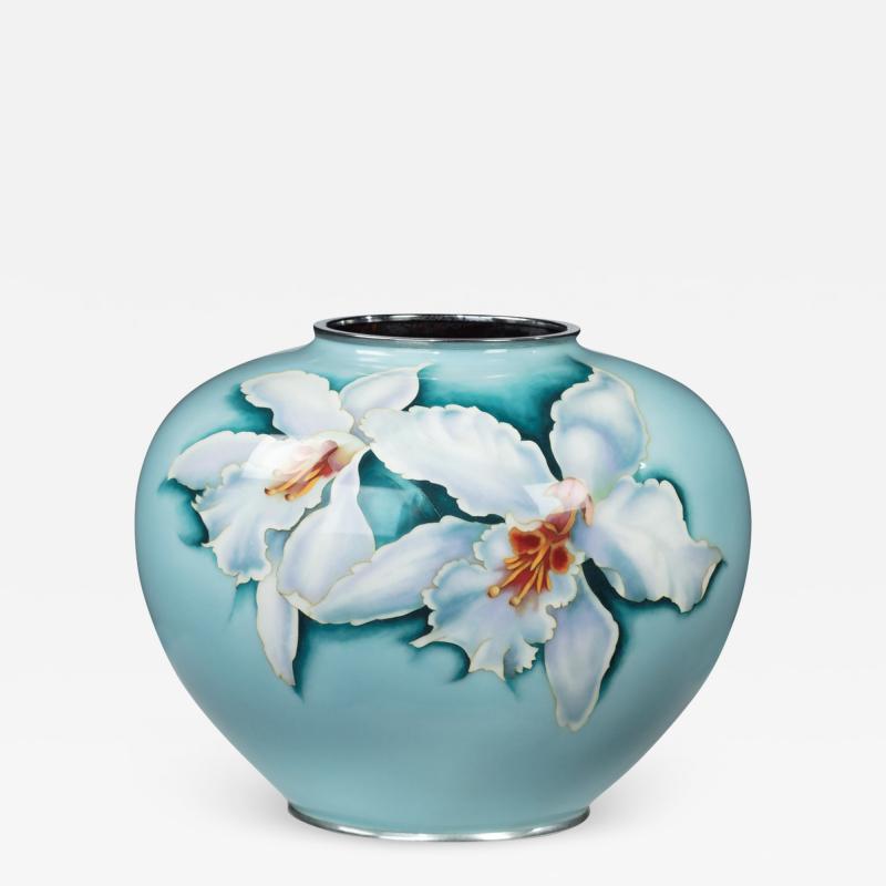 A large bulbous blue Japanese cloisonn vase