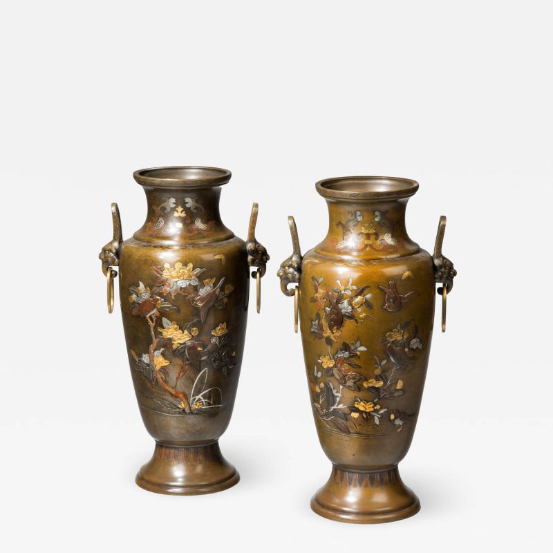 A large pair of mixed metal Meiji Period vases