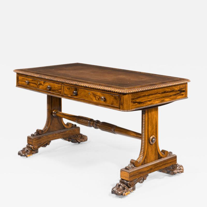 A late Regency rosewood free standing library table by James Winter