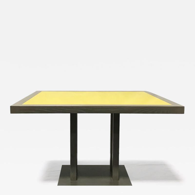 A matching pair of custom cerused oak and yellow lacquered dining tables