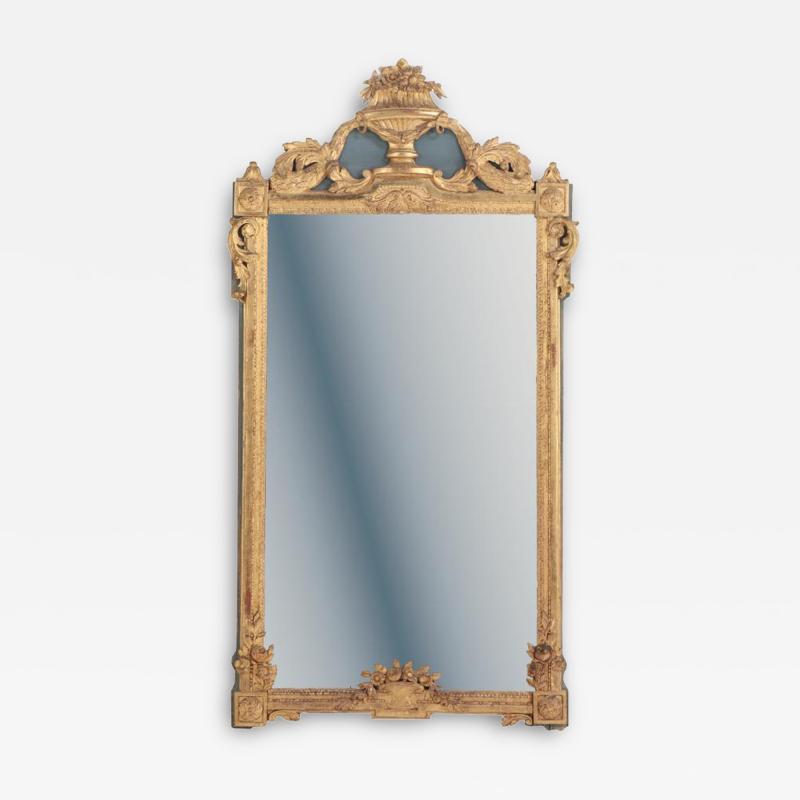 A monumental French Louis XVI style ornate giltwood mirror C 1850 