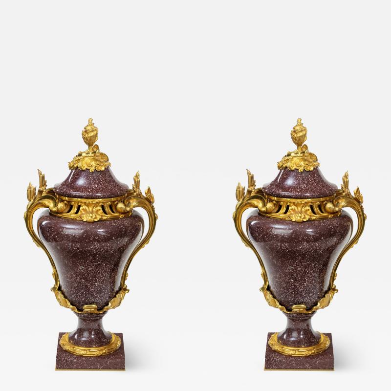 A pair Napoleon III Egyptian imperial porphyry urns and covers