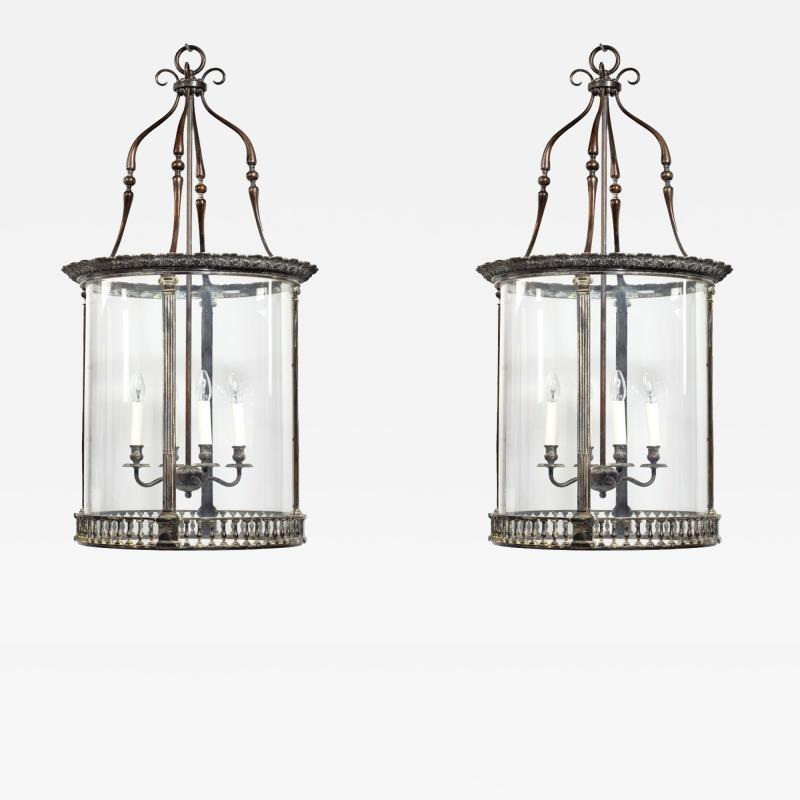 A pair of 20th century brass hanging lanterns in the style of Lutyens