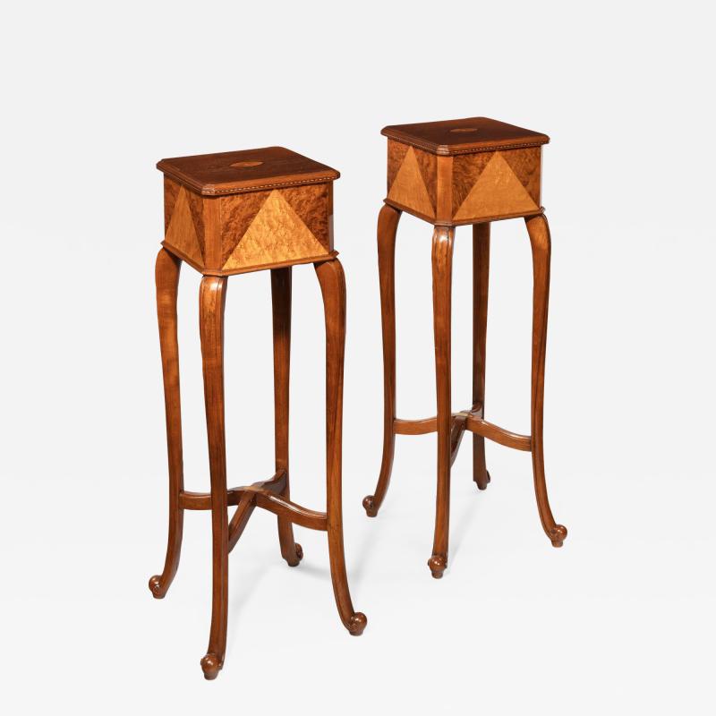 A pair of Anglo Indian teak stands