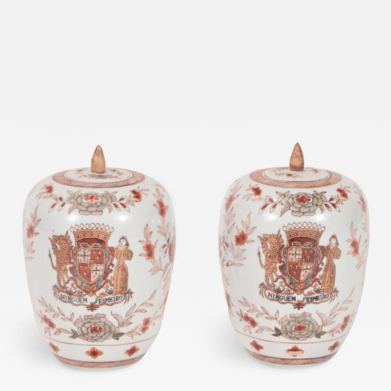 A pair of Chinese porcelain decorated jars with lids 