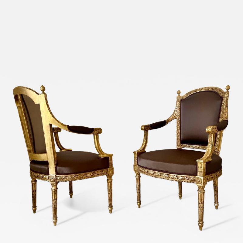 A pair of French Louis XVI Carved Giltwood fauteuils late 18th century Stamped