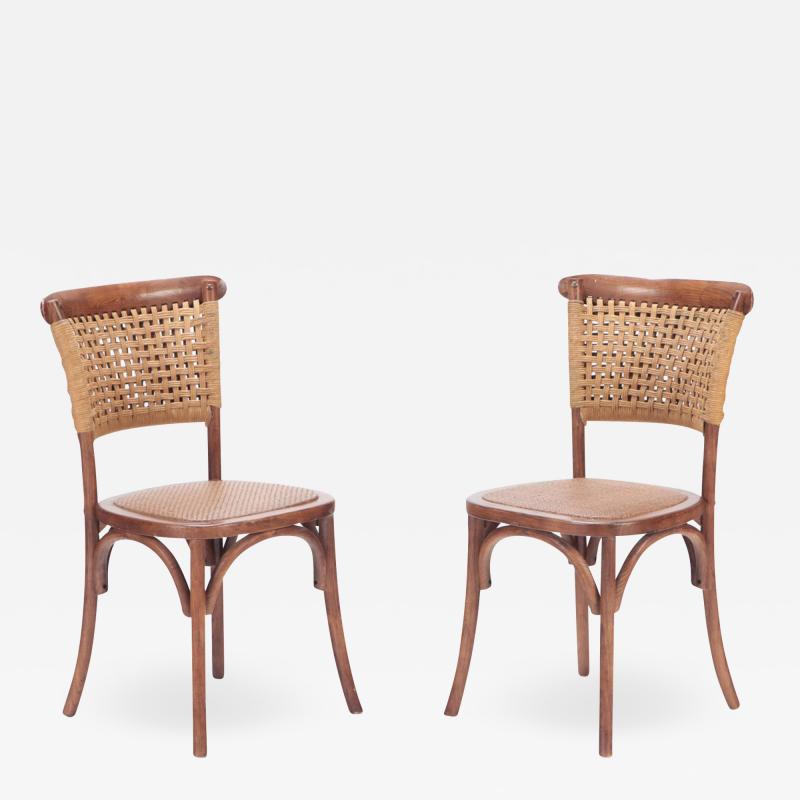 A pair of French Vintage oak side chairs with rattan backs and seats