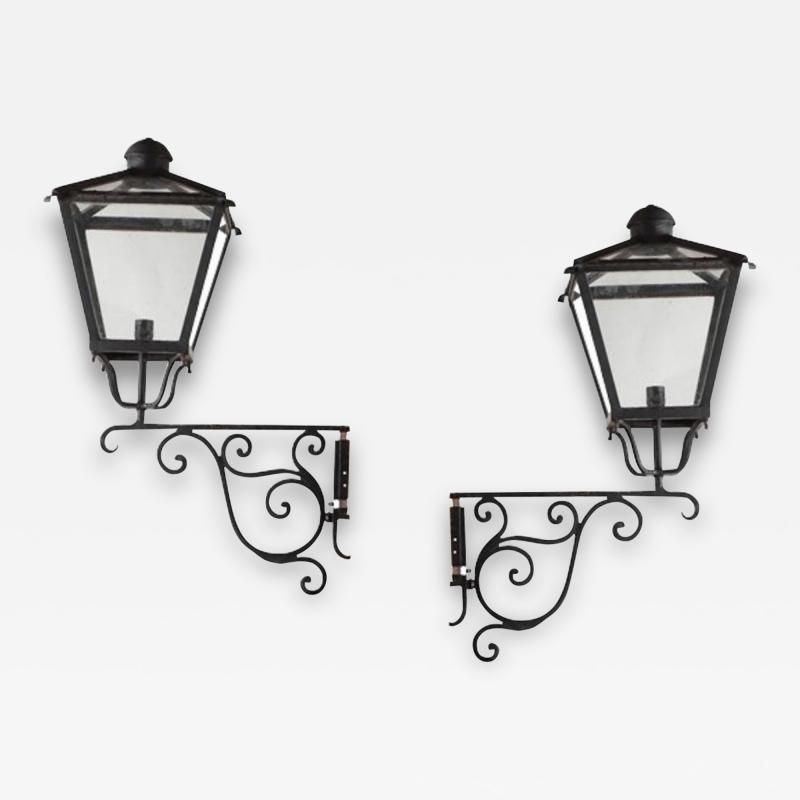 A pair of French iron and bronze lanterns C 1940 