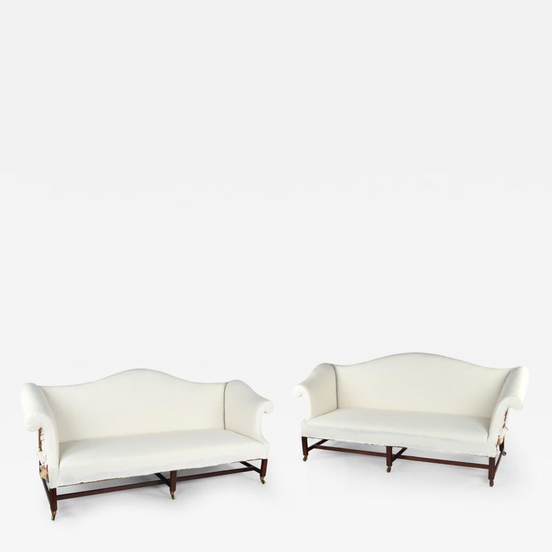 A pair of Georgian mahogany sofas from Powderham Castle sofas settees