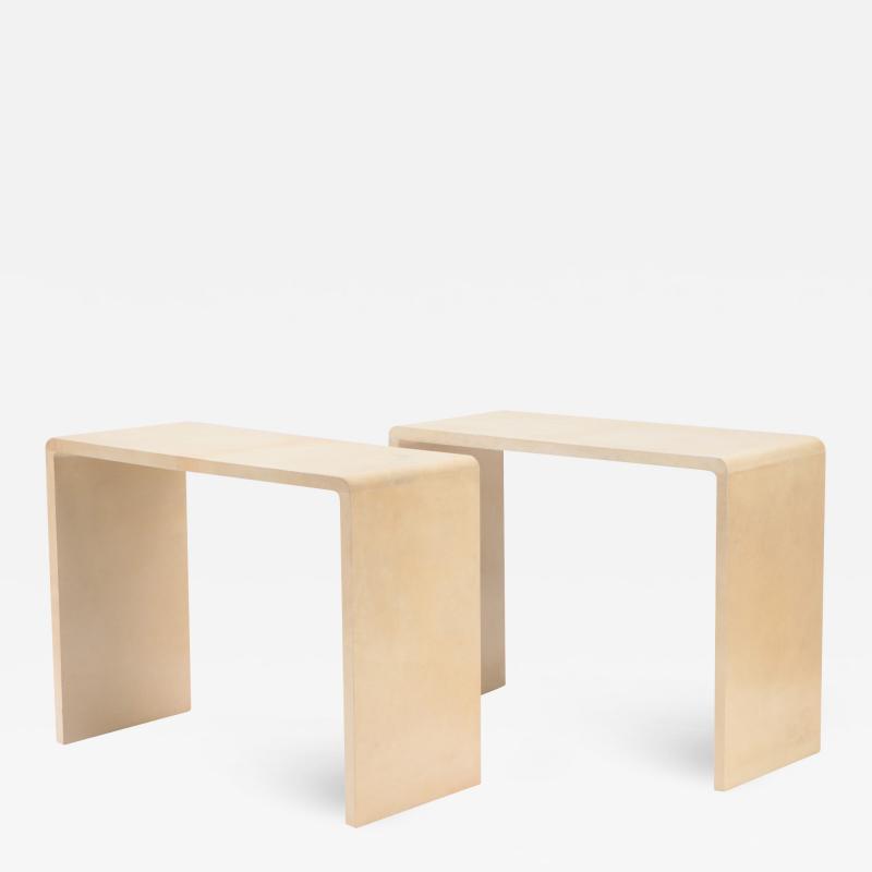 A pair of Jean Michel Frank style waterfall design parchment console tables 
