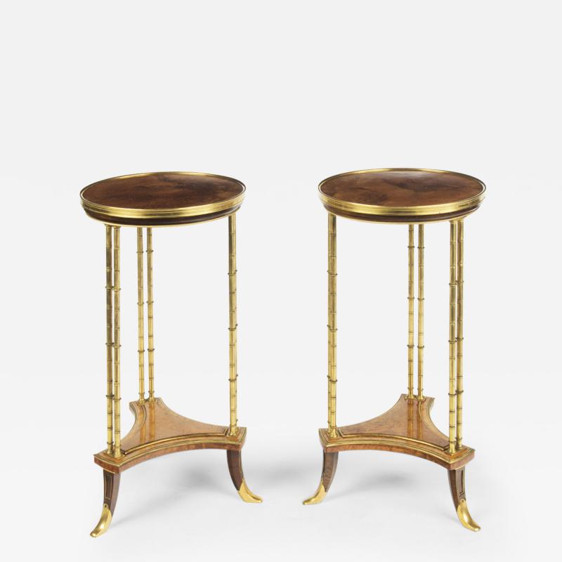 A pair of Louis XVI style mahogany and ormolu gueridons after Adam Weisweiler