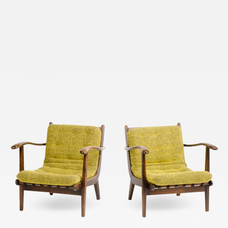 A pair of Mid Century Italian oak armchairs circa 1945