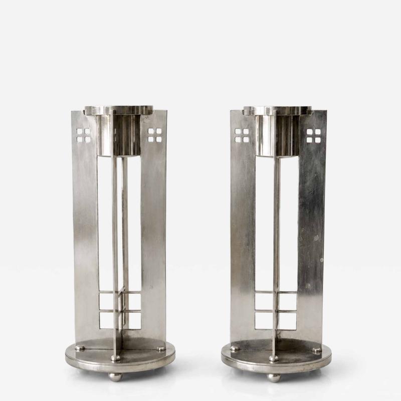A pair of Silver Plate Swid Powell Candlesticks