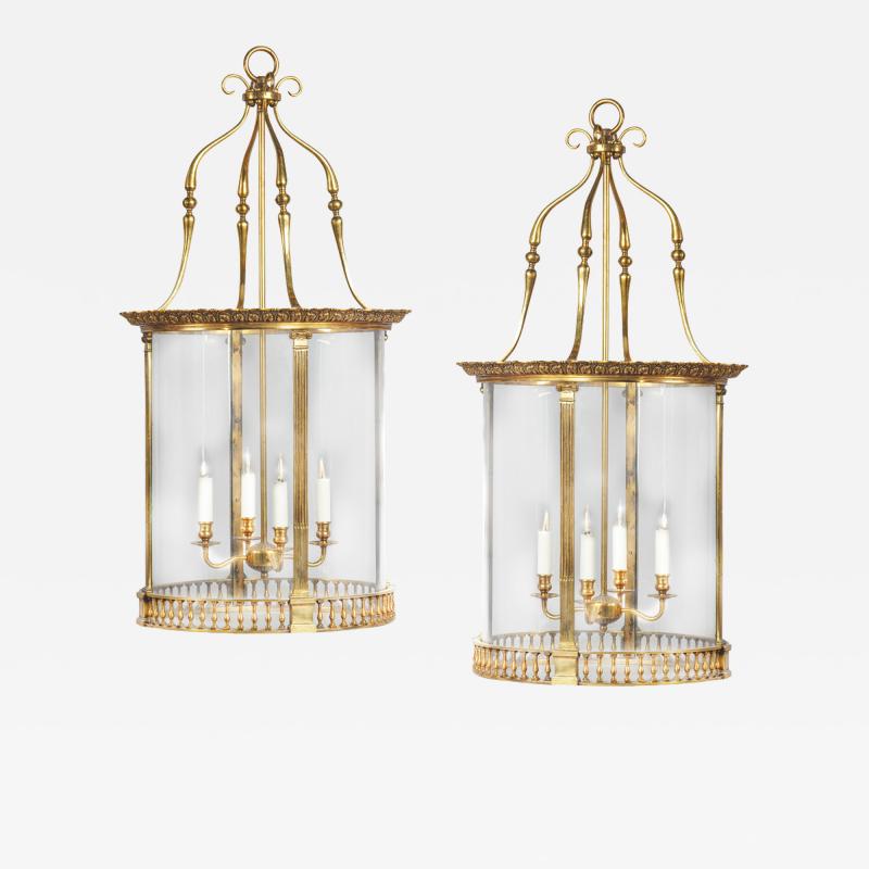 A pair of brass drum lanterns in the style of Lutyens