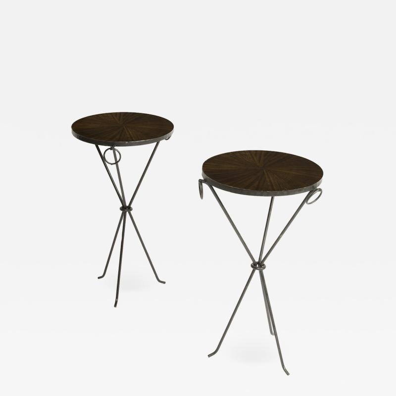 A pair of contemporary wrought iron drink tables 