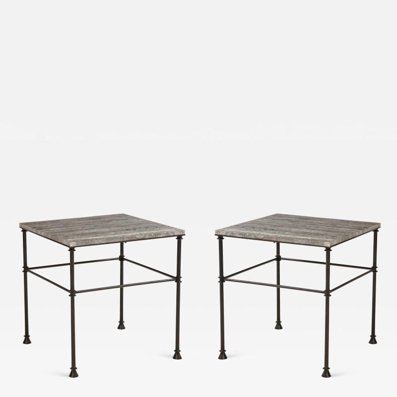 A pair of custom made tables bronze legs and Bleu Oc an color travertine top 