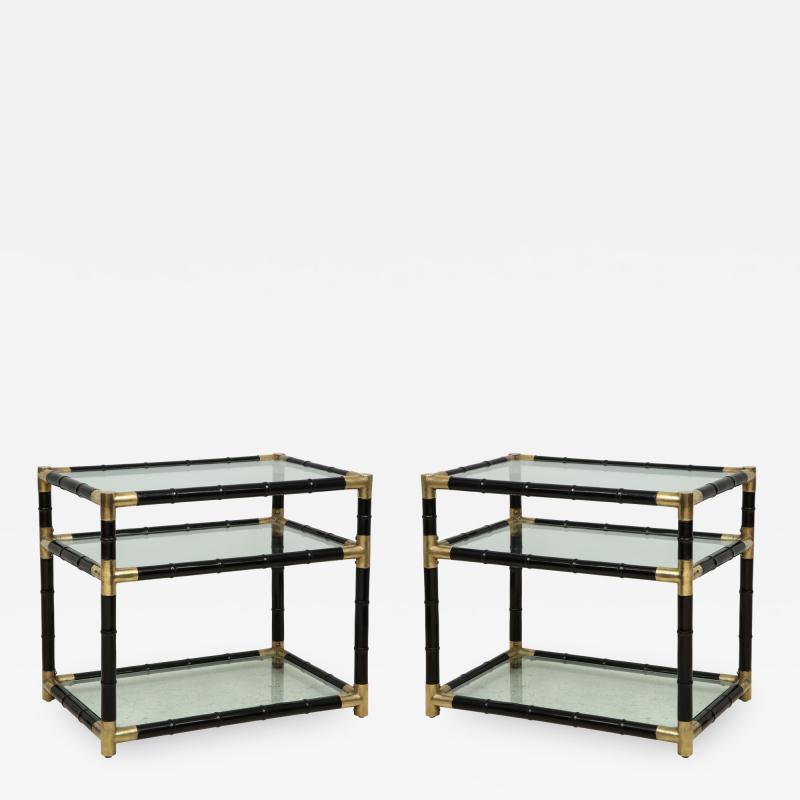 A pair of ebonized faux bamboo and brass tables in the manner of Billy Haines