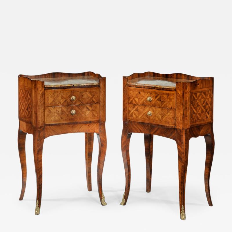 A pair of freestanding French kingwood bedside cabinets