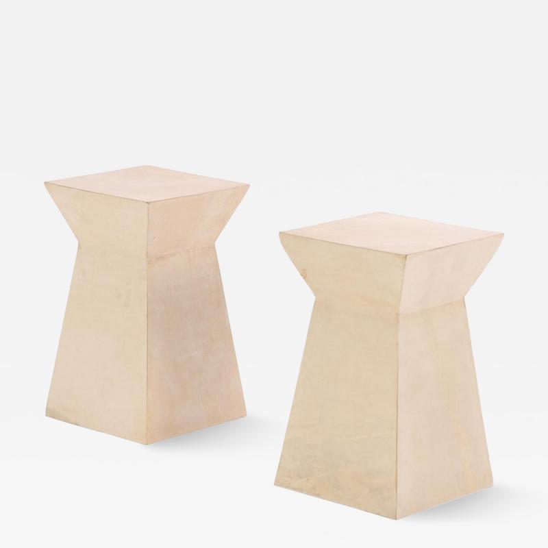 A pair of geometric parchment covered drinks tables 