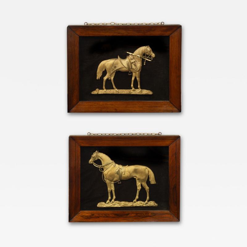 A pair of ormolu equine portraits of famous war horses Copenhagen Marengo 