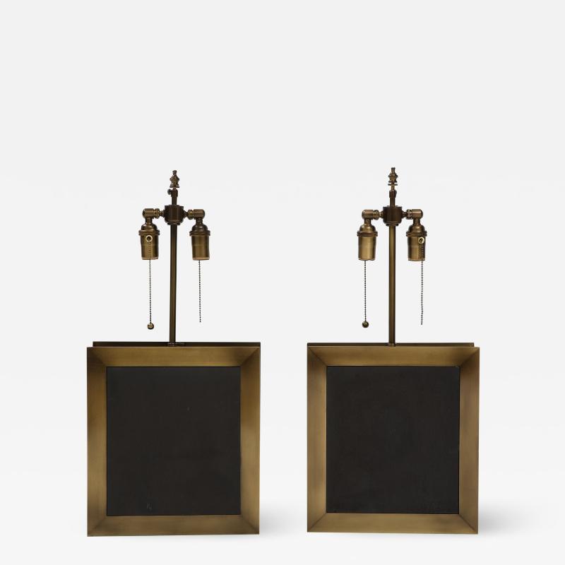 A pair of square shaped lamps made of ardoise cliv e and a bronze frame 