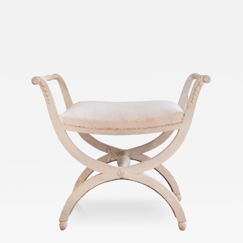 A period Gustavian stool with handles scraped to original paint
