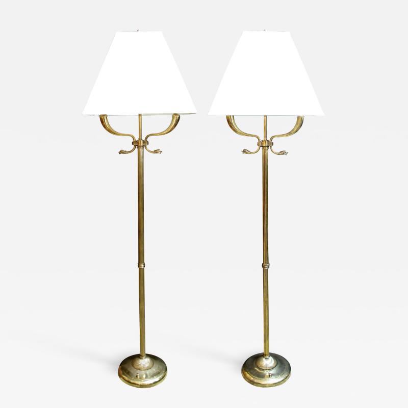 A quality pair of French 1940s empire style brass 2 arm floor lamps